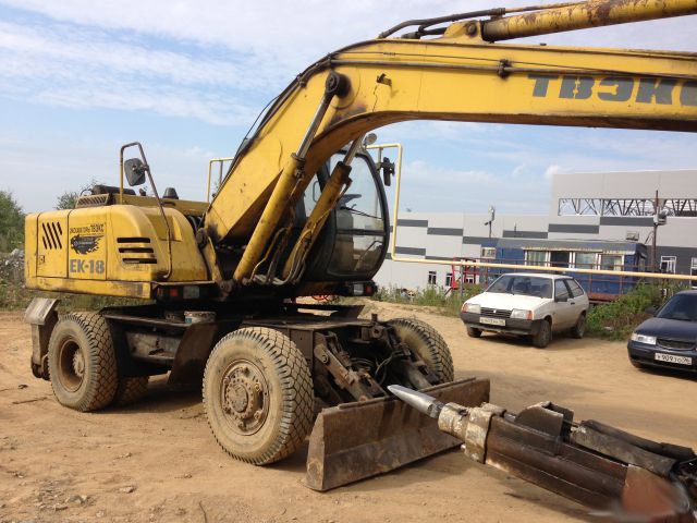 Экскаватор колесный ЕК-14 с гидромолотом, 3000 Дж